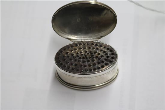 A George III, silver oval nutmeg grater, Peter & Ann Bateman, London, 1799, 44mm.